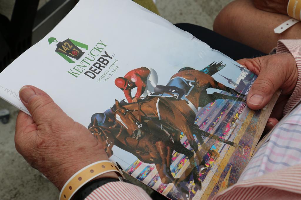 Poole holding his Derby program. (Julie June Stewart photo)